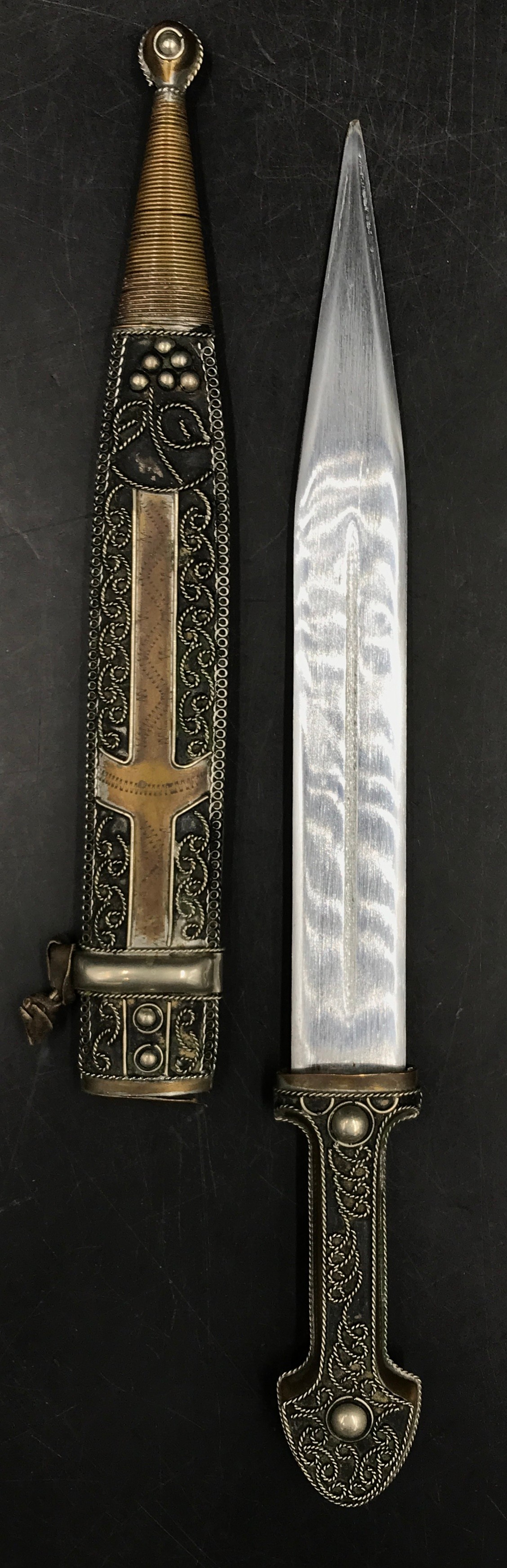 A white metal Russian dagger and scabbard 36cm l, 22.5cm l blade. - Image 2 of 5