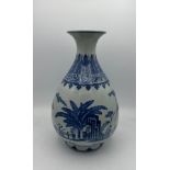 A Chinese blue and white bottle vase, Guangxu mark and period. 29cm h.