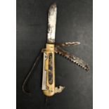 A fisherman's pocket knife with scales holding large knife, small knife, saw, can opener, hook and