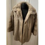 A vintage short mink jacket. 50cm underarm to underarm and 59cm shoulder to hem.