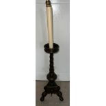 A single bronze candle stand converted to electric. Height to top of attachment 89 x 25cm w at base.