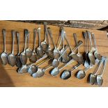 A large quantity of worn and damaged silver teaspoons, mainly Georgian. Various dates and makers.