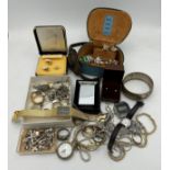 A quantity of vintage costume jewellery to include Zippo lighter, rings, earrings etc.