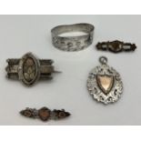 Silver brooches, fob and ‘Baby’ napkin ring. Various dates and makers.