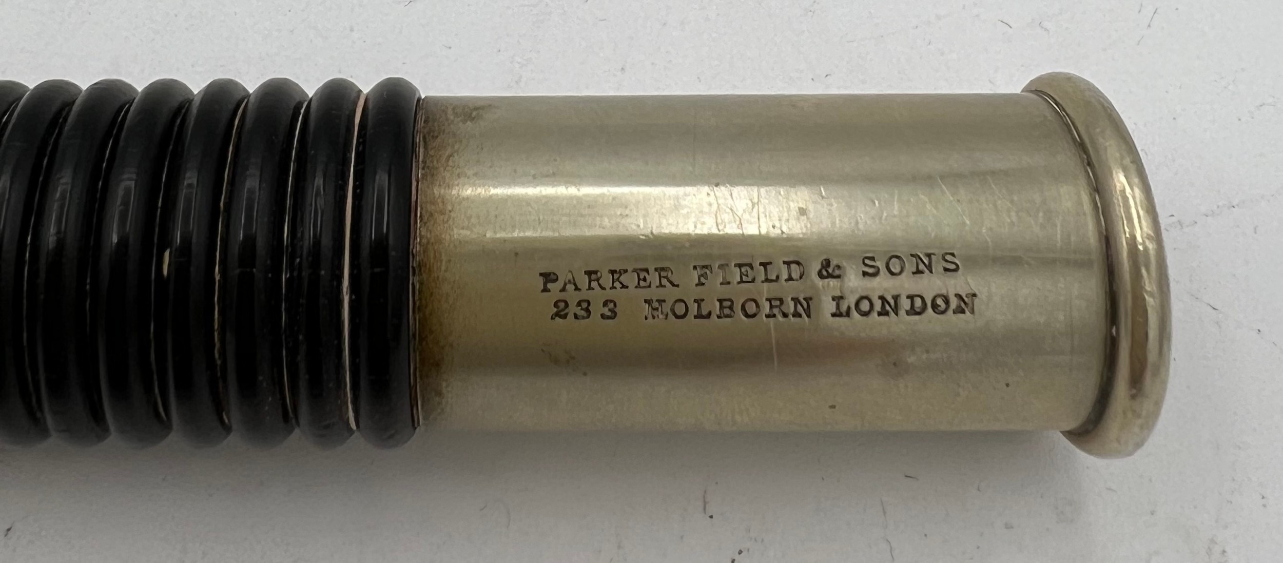 A metal and rosewood tipstaff with brass crown finial. Inscribed Parker Field & sons 233 Holborn - Image 3 of 6