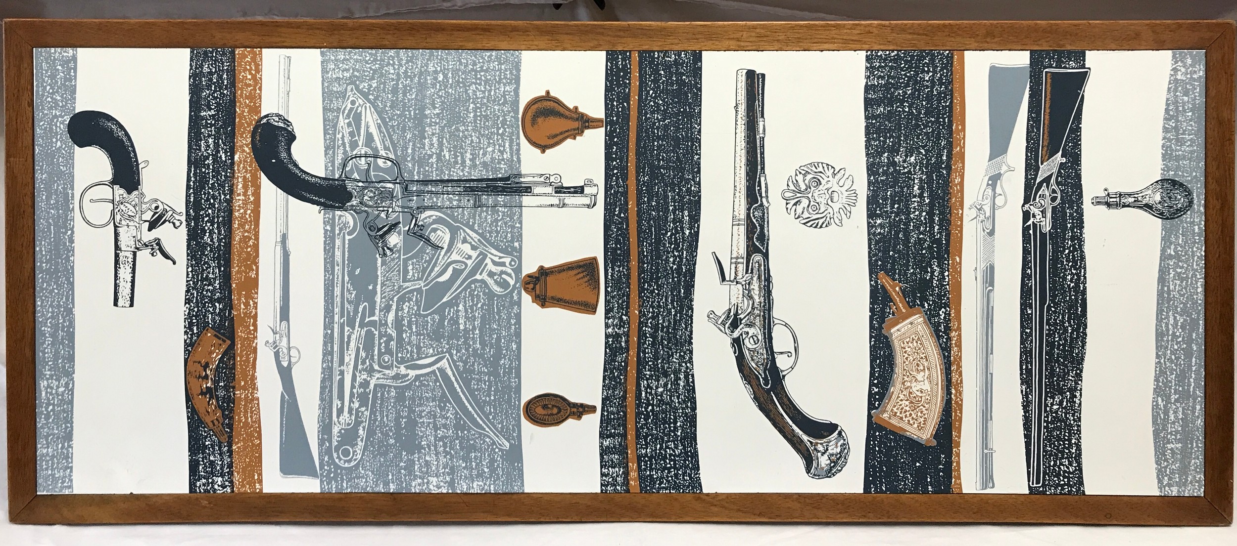 A coffee table with a top lithographed with guns, 12 l x 53 d x 41cm h. - Image 2 of 3