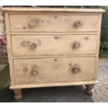 A pine chest of drawers. 91h x 93 l x 47cm d.