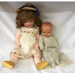 An Armand Marseile/Koppelsdorf bisque head doll with 'A.M. Koppelsdorf, Germany 996 A.7.M' marked to