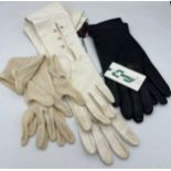 Three pairs of vintage gloves to include long white kid leather, unworn black leather and short