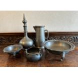 A selection of pewter dishes, decanter etc. to include a Kayaoglu Bakircilik raised dish. Various