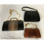 A collection of three ladies handbags to include one made of genuine snake skin, one made of genuine