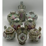 Eight pieces of Japanese moriage decorated ceramics to include teapots and vases. Tallest vase