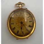 A 14 carat gold cased pocket watch, gilt dial with Roman numerals. Stamped K14 with Squirrel