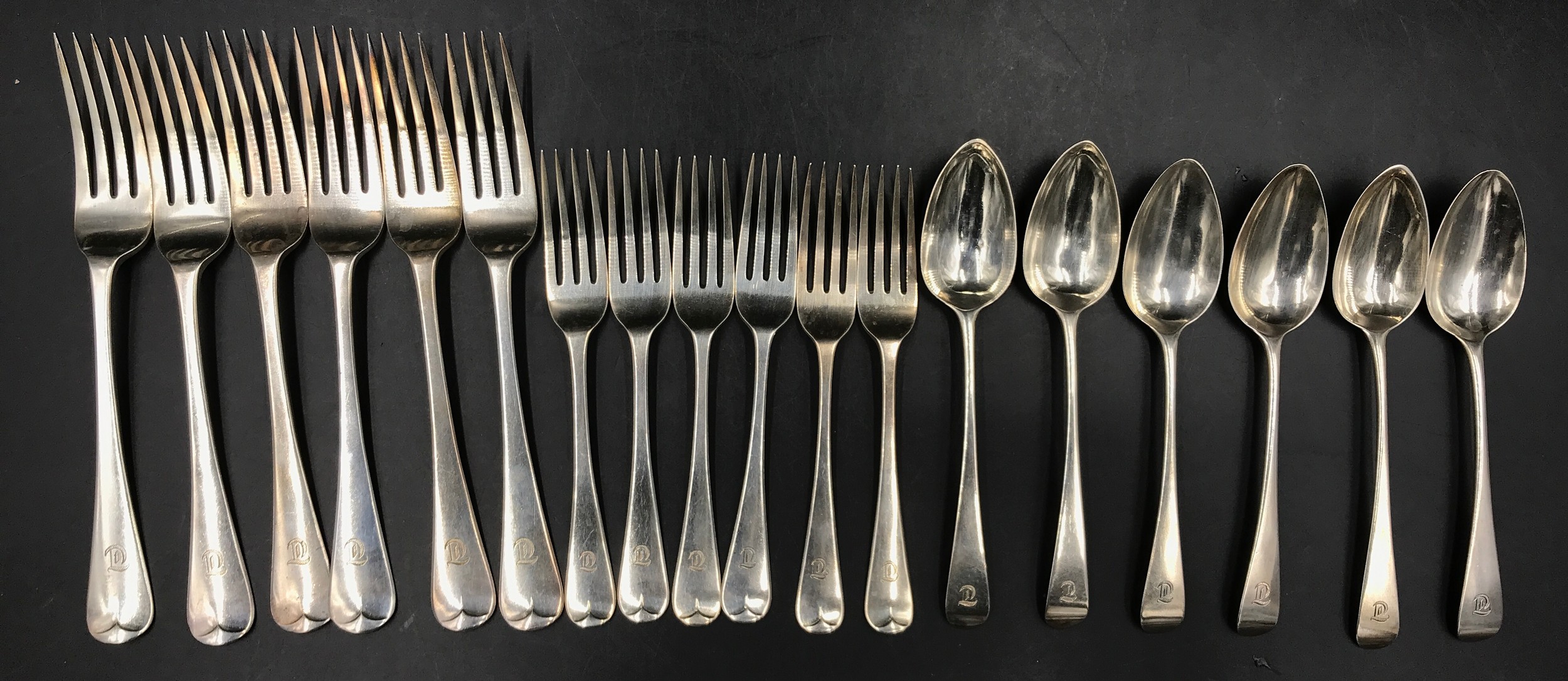 A harlequin set of Old English Pattern cutlery, six table forks, London 1828, maker Josiah Piercy I,