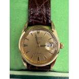 A 1961 Rolex Oysterdate Precision gold plated wristwatch on brown leather strap, Serial Ref: 6694,