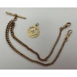 A 9ct gold fob watch chain and a 9ct gold medallion. Total weight 30.5gms.