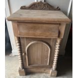 A pine single door cabinet with drawer above. 82 h x 51 w x 38cm d.