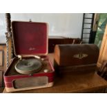 A Bush Garrard 4SP record player together with a Singer sewing machine.