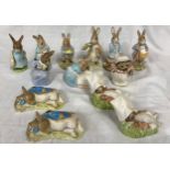 ROYAL ALBERT: a collection of thirteen Beatrix Potter figures including Peter and the Red Pocket