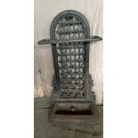A Victorian cast iron stick stand with removable drip tray. registration lozenge to rear, together