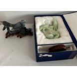 A jade figure of two birds with wooden stand in original fitted case 19 cm h with another bird on