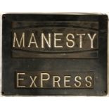 A cast iron sign reading 'Manesty Express' 32 x 42cm.