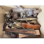 A boxed lot of various 19thC/20thC tools to include planes, levels etc.