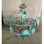 Metal chandelier with vine leaf decoration. 56cm h to top of fitting.