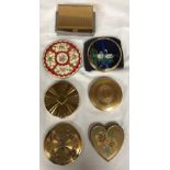 A selection of 7 powder compacts to include one musical by Carene, Swiss made, two Stratton both