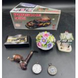 A miscellany of items to include a battery operated Porsche 935, Ringtons Tea Classix Collection