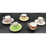 Four various ceramic coffee cans and saucers and additional can to include one Aynsley set and