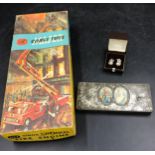 A miscellaneous lot to include a Corgi fire engine in original box, a tin from Rowntree & Co Ltd