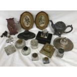 A collection of various inkwells some with wooden bases, silverplate and brass along with a wooden