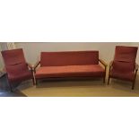 A Guy Rogers three piece suite comprising a sofa bed 77 h x 202 w x 100cm d and two reclining chairs