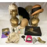A 1920's flapper's wig, plaited and coiled to the sides, together with two cloche ladies hats,