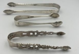 Three pairs of sugar tongs, two silver, Chester 1896 maker George Nathan and Ridley Hayes. Sheffield