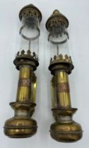 A pair of brass GWR wall mounted brass carriage lamps with glass shades and pierced brass vents.