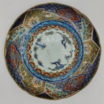 An 18th/19thC Japanese Imari dish in 'The Three Friends of Winter' design with apocryphal marks.