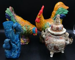 A collection of ceramics to include, a 20thC colourful cockerel and hen, a late 19thC twin handled