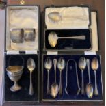 Hallmarked silver to include two napkin rings, boxed spoons and sugar tongs, egg cup and spoon
