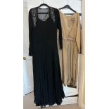 Two dresses, the first a 1940's lined black chiffon dress with bead work embellishment to the