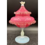 A 1950’s Murano glass candy jar in pink, milk and clear glass. Approximately 29cm h.