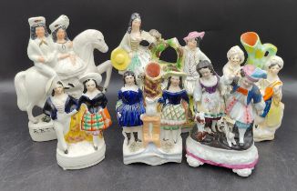 A collection of six 19thC Staffordshire figures to include two children in sailors outfits, two