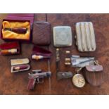 Cigar accessories, cheroot holders and accessories, to include amber, bone and silver holders etc