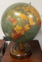 A vintage terrestrial globe on a turned wood base. Georama Ltd. 65cm h together with a three time