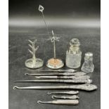 A quantity of hallmarked Silver to include 7 button hooks, a nail file, a hat pin, a ring tree, a