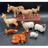 Beswick figures of animals to include 3 donkeys, 3 foxes, 3 sheep and one deer all stamped to base.