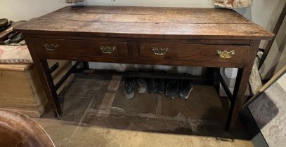 A 19thC oak side table with two drawers and original handles. 153cm w x 55cm d x 78cm h.