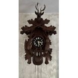 A 19thC Black Forest cuckoo clock.
