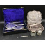 A collection of silver backed and topped items to include, a silver nine piece vanity set for